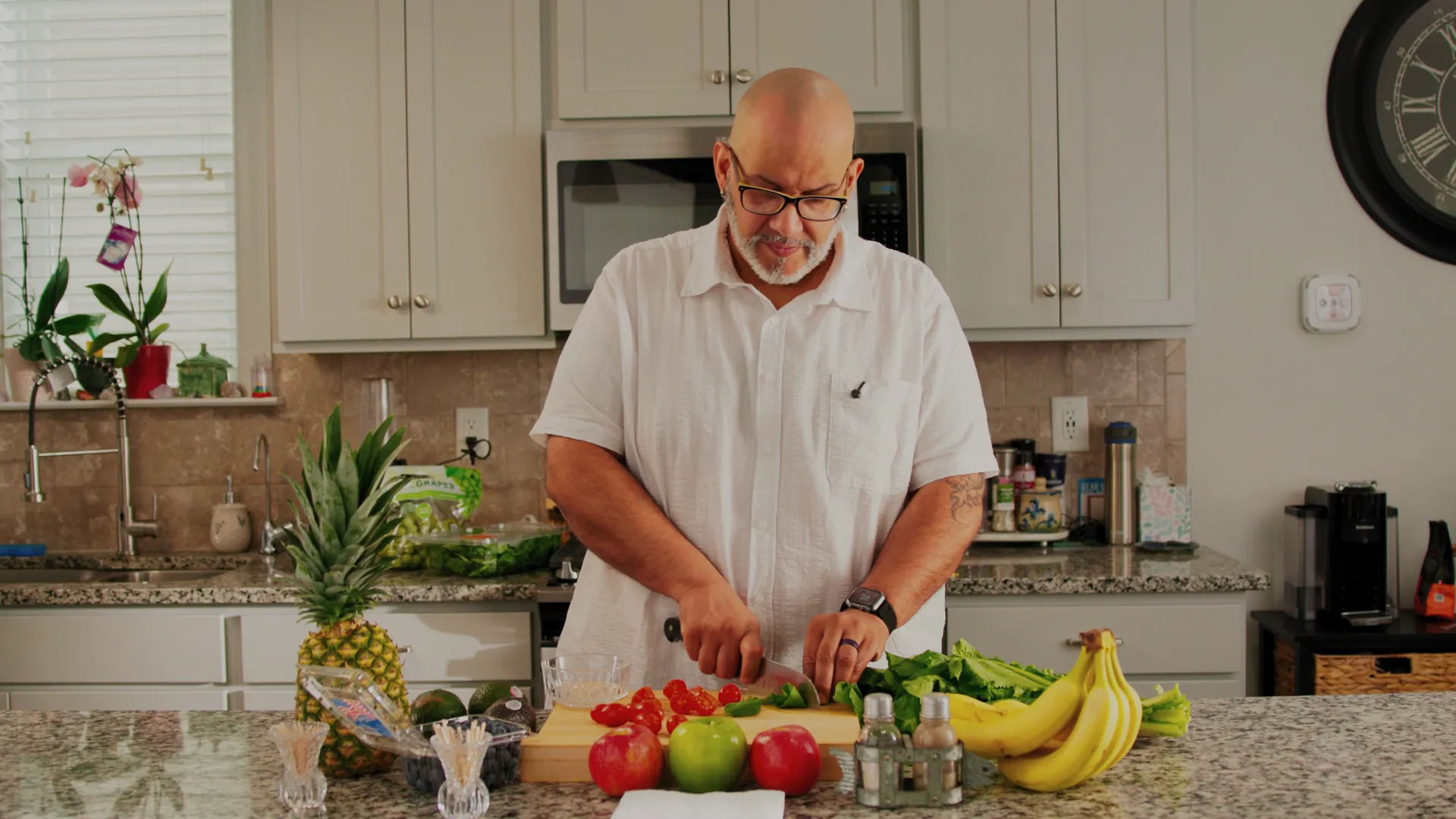 A BridgeWell member preparing a protein-forward meal in his kitchen as part of a whole-person weight-care routine